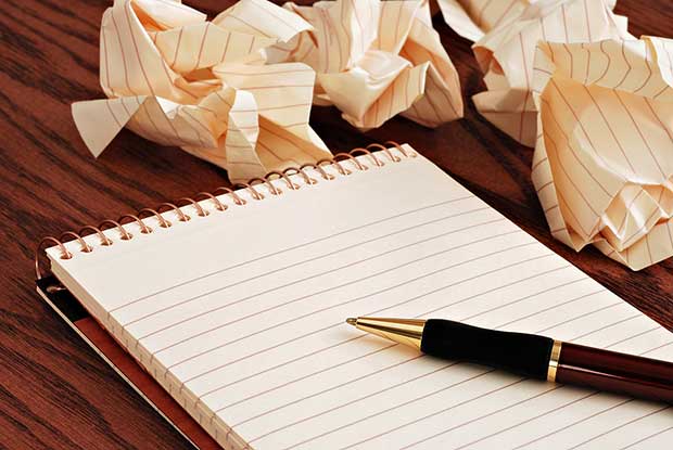 bigstock_Blank_notepad_with_ink_pen_on__15024992-2