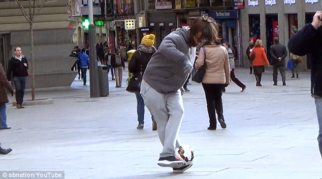 The 30-year-old goes unnoticed as he shows off his freestyle skills on the streets of Madrid